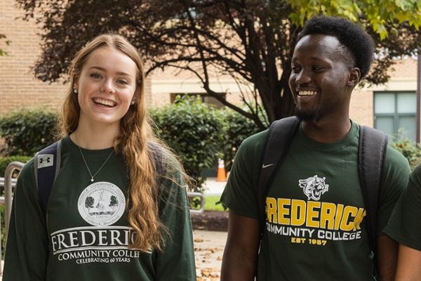 two FCC students smiling
