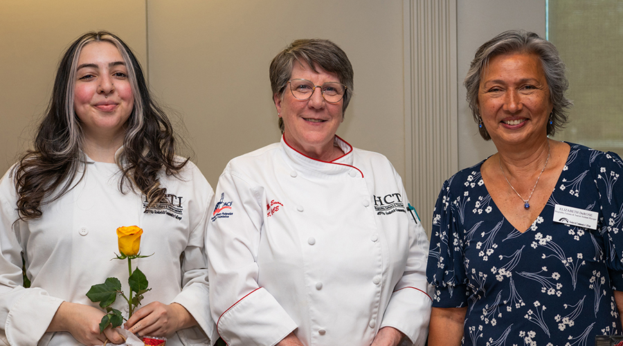 2 HCTI students with Elizabeth DeRose